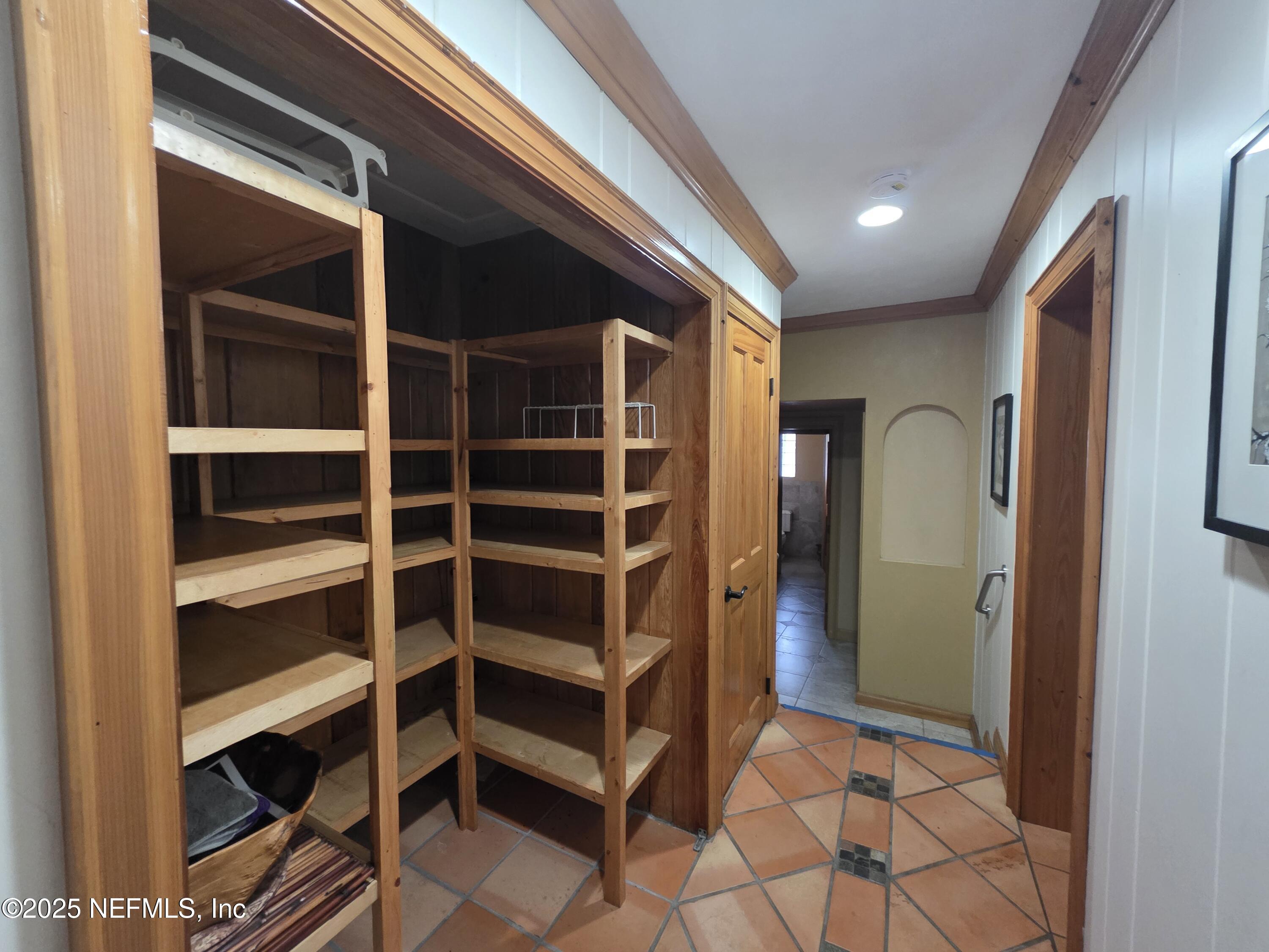 721 Bunnell Road Pierson, FL 32180 - Photo 37 of 59 a view of an empty room with wooden floor and closet