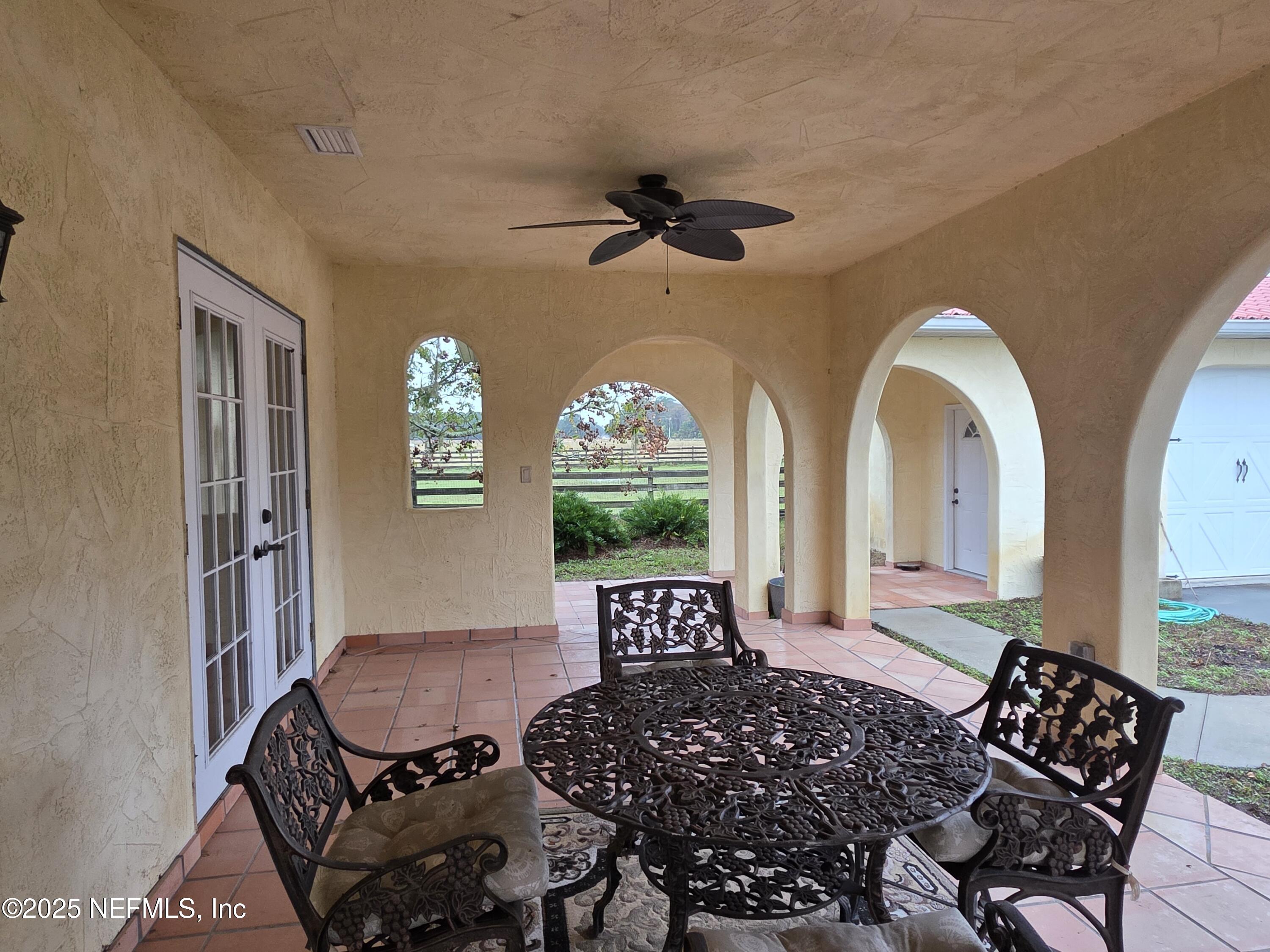 721 Bunnell Road Pierson, FL 32180 - Photo 6 of 59 a view of a livingroom with furniture and a large window