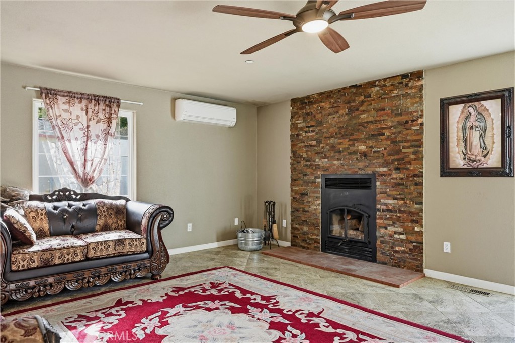 26200 Morgan Valley Road Lower Lake, CA 95457 - Photo 17 of 69 a living room with furniture and a fireplace