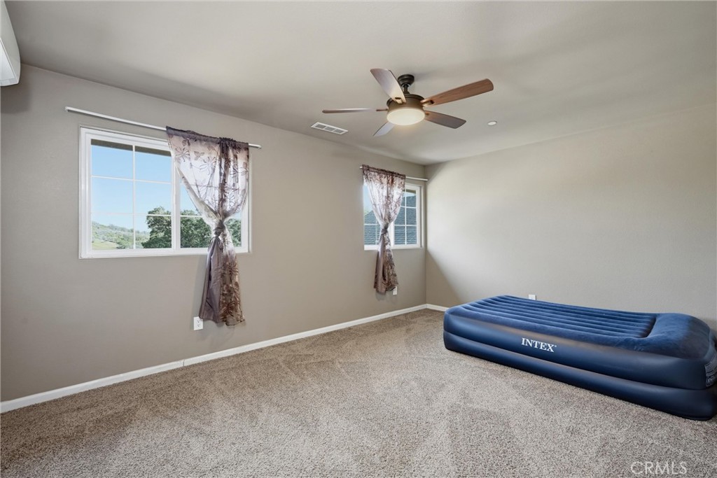 26200 Morgan Valley Road Lower Lake, CA 95457 - Photo 31 of 69 a view of room with window and ceiling fan
