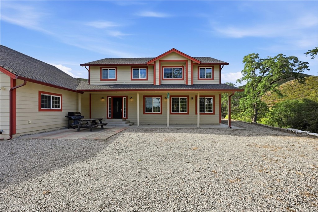 26200 Morgan Valley Road Lower Lake, CA 95457 - Photo 53 of 69 a front view of a house with yard and parking