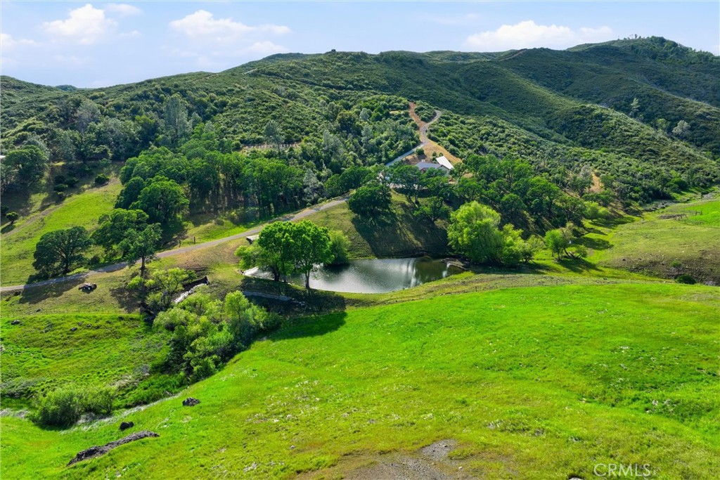 26200 Morgan Valley Road Lower Lake, CA 95457 - Photo 63 of 69 a view of a lush green hillside and houses