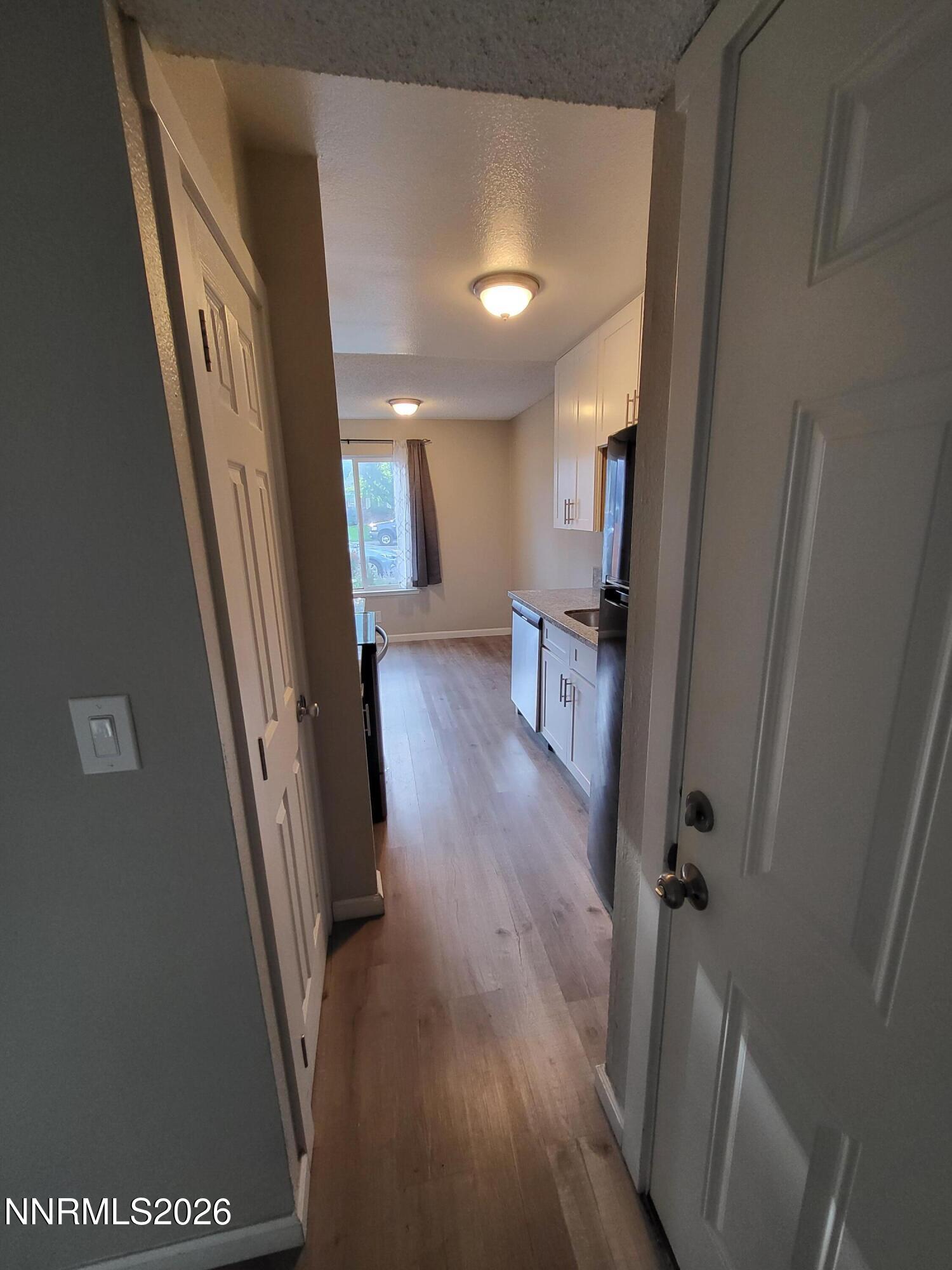 4606 Neil Road, Unit 197 Reno, NV 89502 - Photo 24 of 26 wooden floor in a gallery