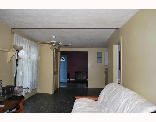 1390 Rt, Unit 588 Fombell, PA 16123 - Photo 14 of 16 Other. View II of living room/dining room to familyroom