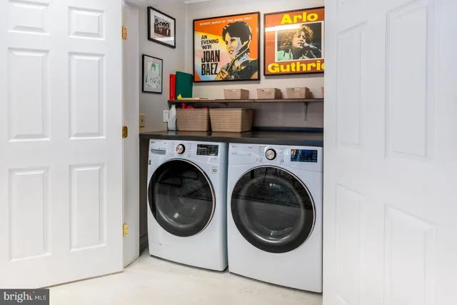 a living room with furniture and a gate