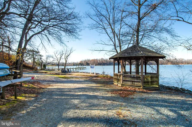 a balcony with wooden floor and outdoor space