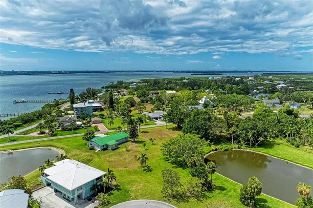 a view of a lake with a yard