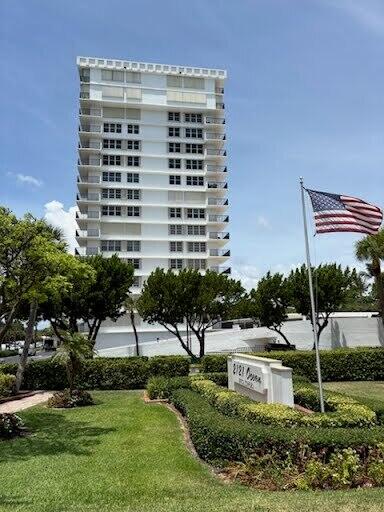 2121 North Ocean Boulevard, Unit 1006E Boca Raton, FL 33431 - Photo 1 of 64 a view of a building with a yard