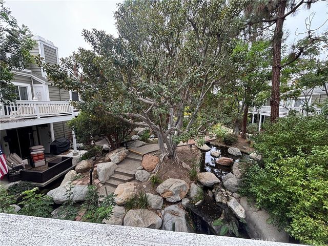 an outdoor space with lots of trees