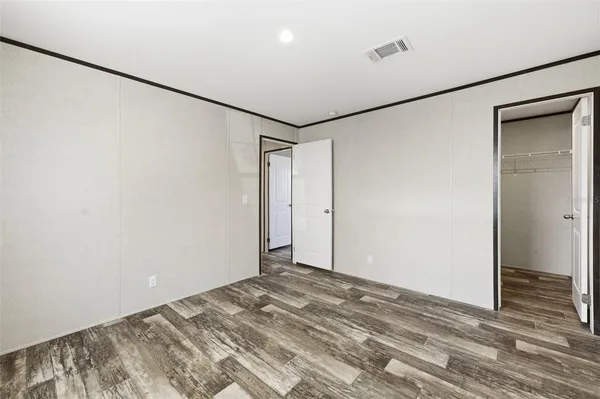 a view of room with walk in closet