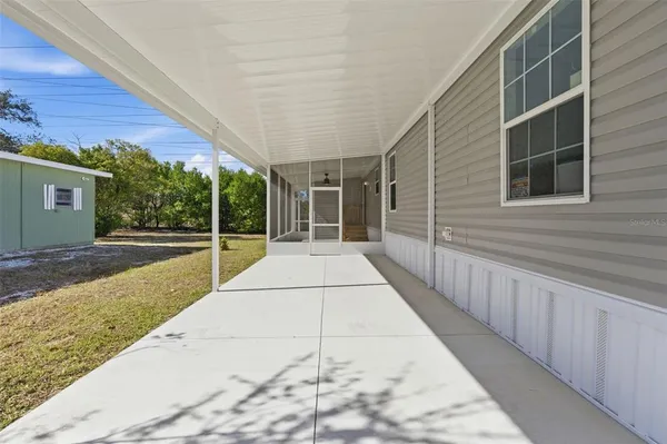 a view of a pathway along the building