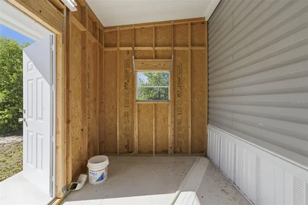 a bathroom with a toilet a sink and shower