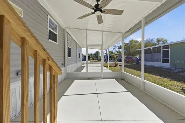 a view of a porch with furniture