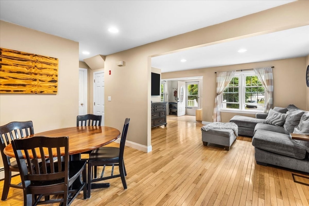 20 Cooks Lane Bellingham, MA 02019 - Photo 7 of 21 a view of a dining room with furniture window and wooden floor