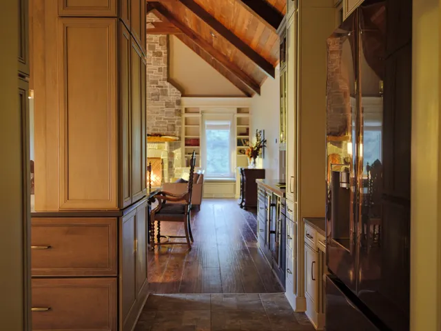 a bathroom with a granite countertop sink toilet and mirror