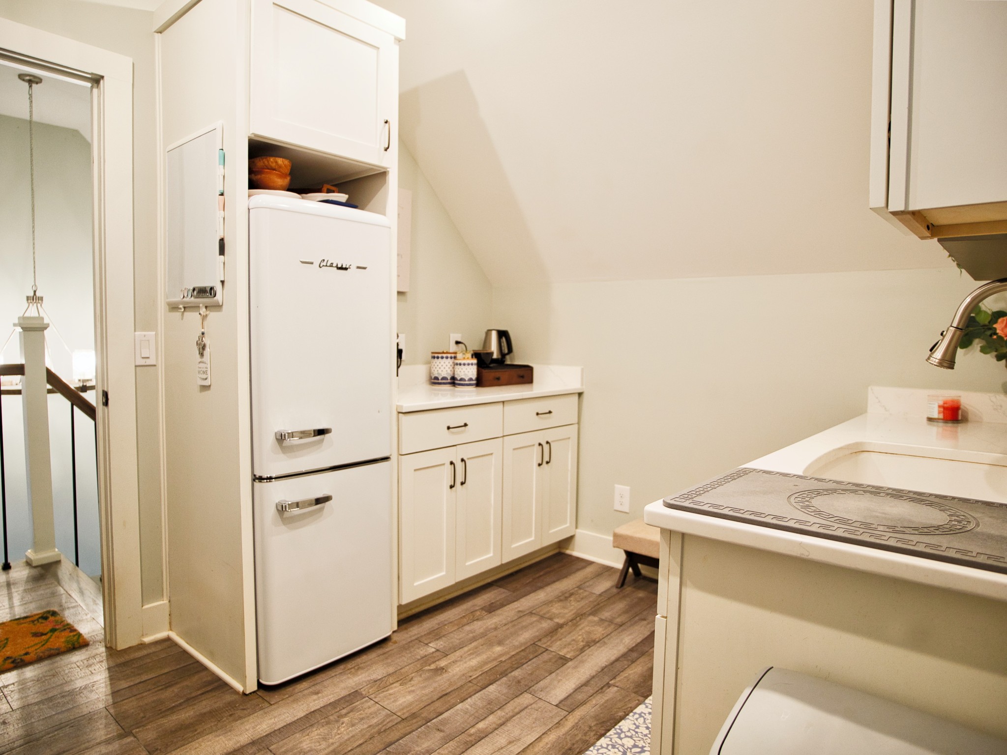 450 Lowe Branch Road Centerville, TN 37033 - Photo 73 of 100 a utility room with cabinets washer and dryer