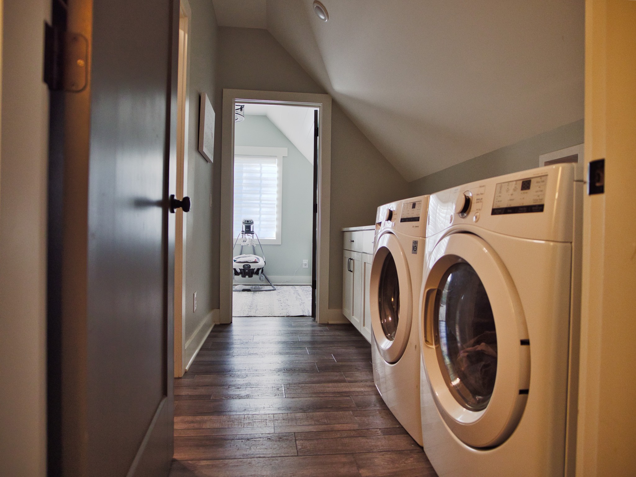 450 Lowe Branch Road Centerville, TN 37033 - Photo 77 of 100 a view of a storage and utility room with washer and dryer