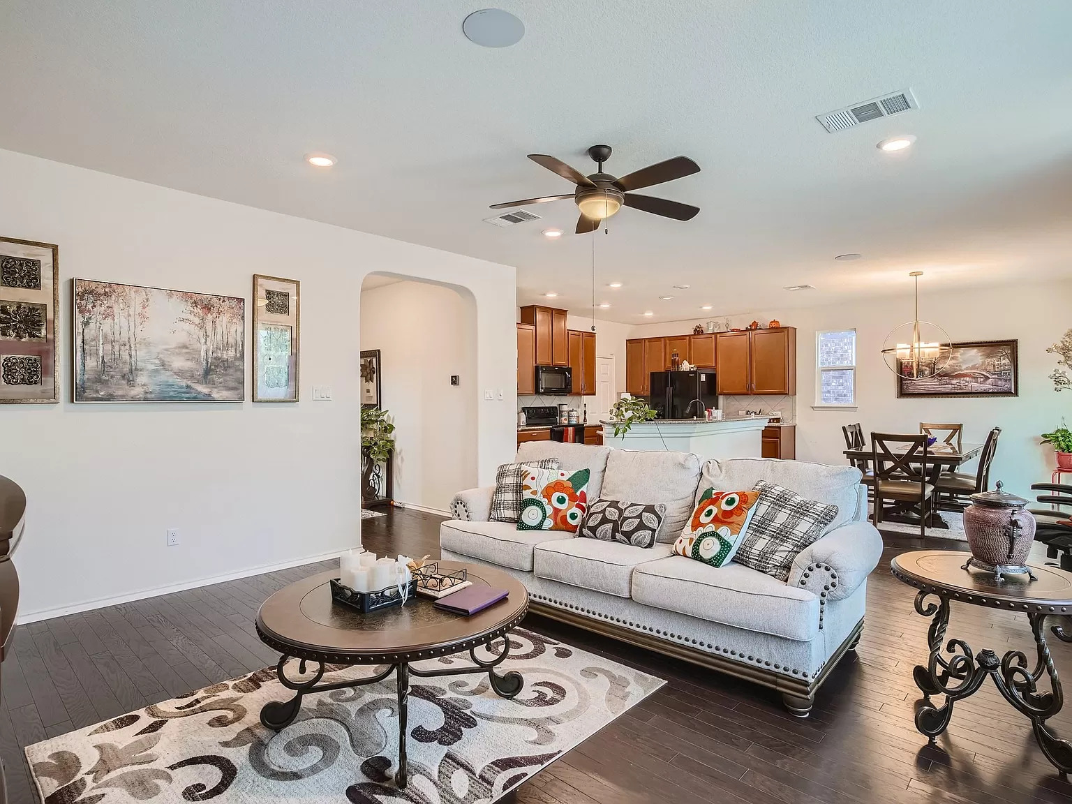 2471 Sunrise Road, Unit 64 Round Rock, TX 78664 - Photo 13 of 30 a living room with furniture and wooden floor