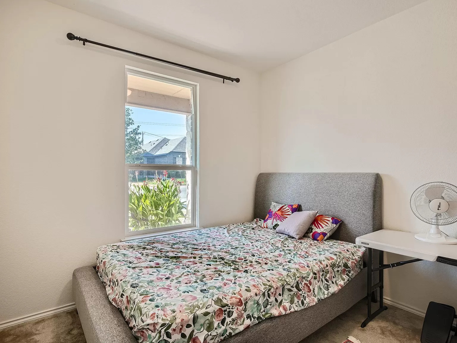 2471 Sunrise Road, Unit 64 Round Rock, TX 78664 - Photo 15 of 30 a bedroom with a bed and a window