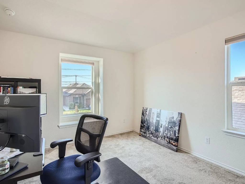 2471 Sunrise Road, Unit 64 Round Rock, TX 78664 - Photo 21 of 30 a view of workspace with windows recliner chair