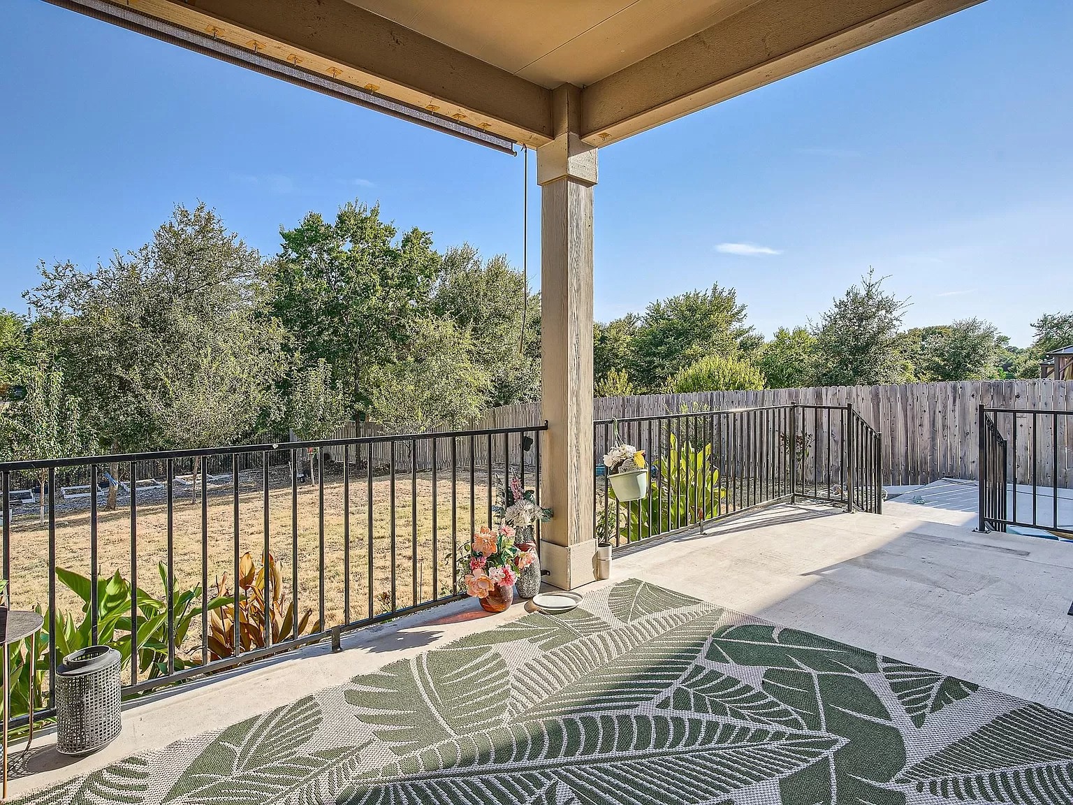 2471 Sunrise Road, Unit 64 Round Rock, TX 78664 - Photo 25 of 30 a view of balcony with wooden floor and outdoor seating