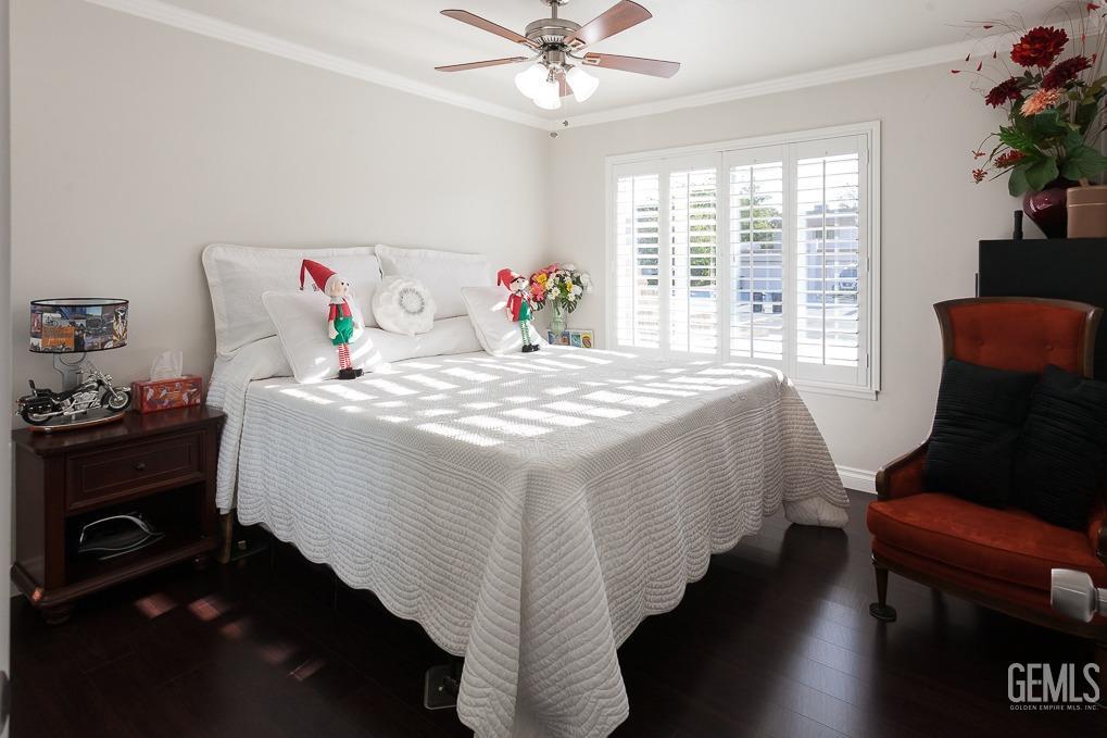 Undisclosed Address Ridgecrest, CA 93555 - Photo 15 of 23 a bedroom with a bed and a couch