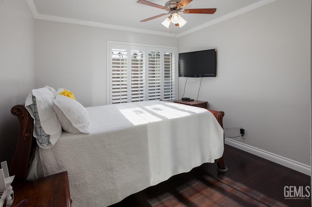 Undisclosed Address Ridgecrest, CA 93555 - Photo 17 of 23 a bedroom with a bed tv and a window