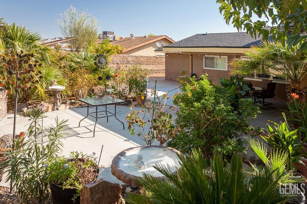 Undisclosed Address Ridgecrest, CA 93555 - Photo 21 of 23 a view of a house with a yard and plants