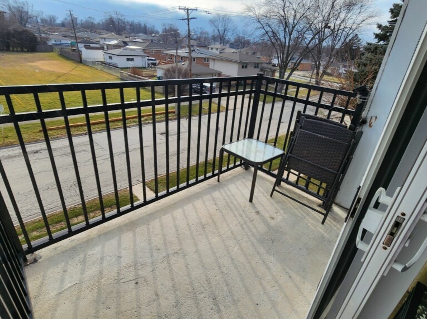 6440 Pamela Lane, Unit 12 Chicago Ridge, IL 60415 - Photo 14 of 15 a view of a balcony with wooden floor