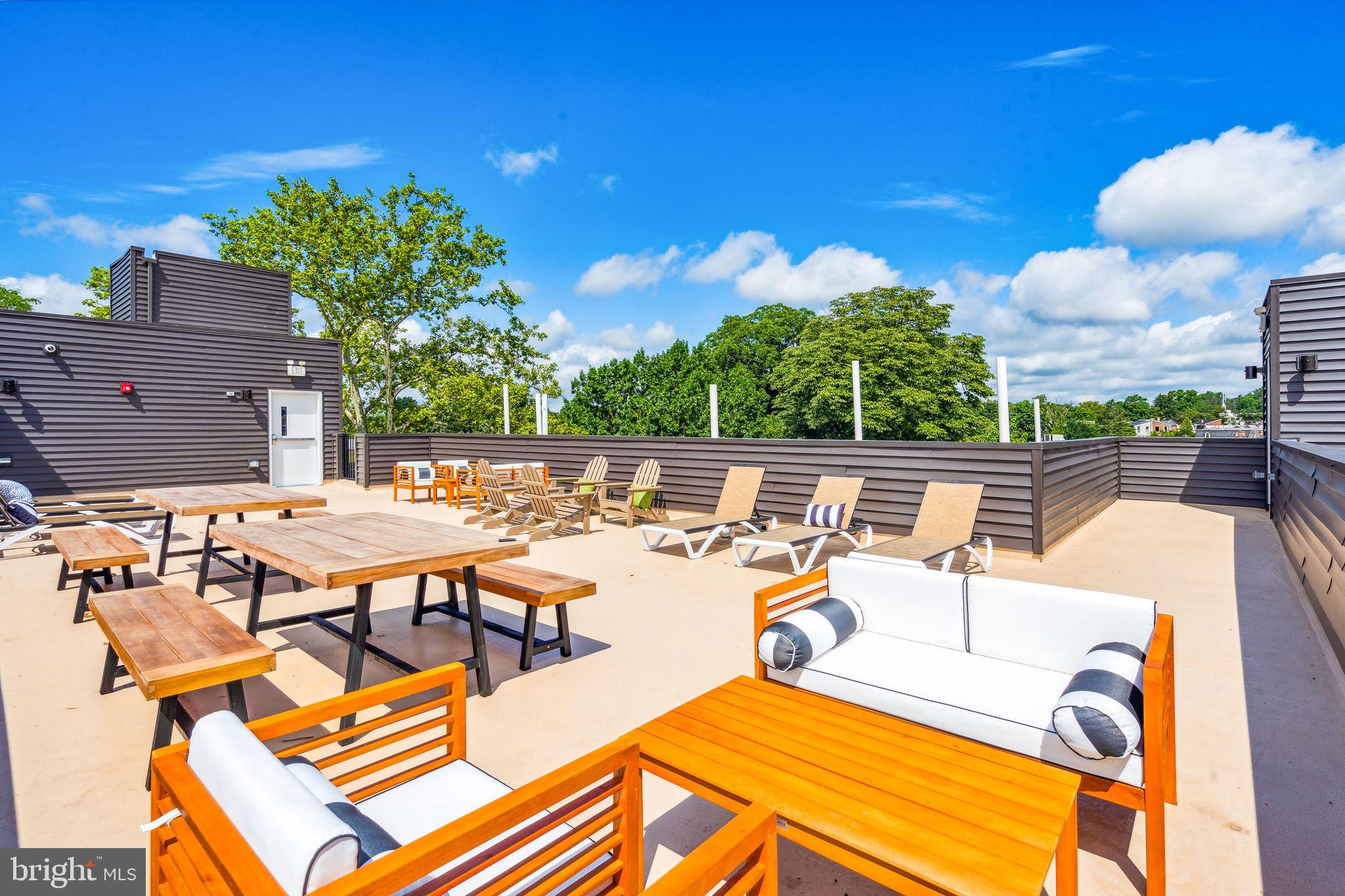 a view of a patio with swimming pool