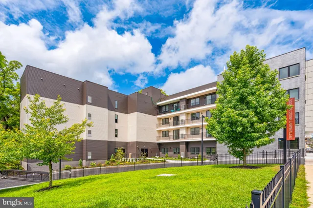 a view of a house with a park
