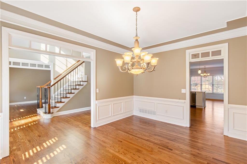 2020 Cockrell Run Northwest Kennesaw, GA 30152 - Photo 27 of 85 a view of a livingroom with wooden floor and staircase