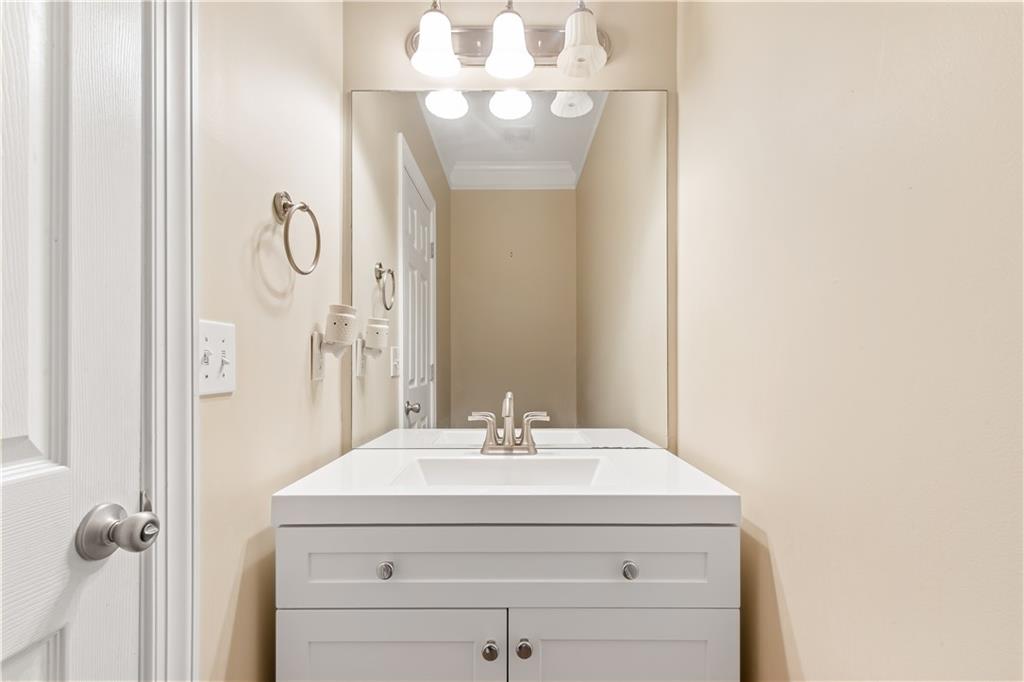 2020 Cockrell Run Northwest Kennesaw, GA 30152 - Photo 41 of 85 a bathroom with a sink and a mirror