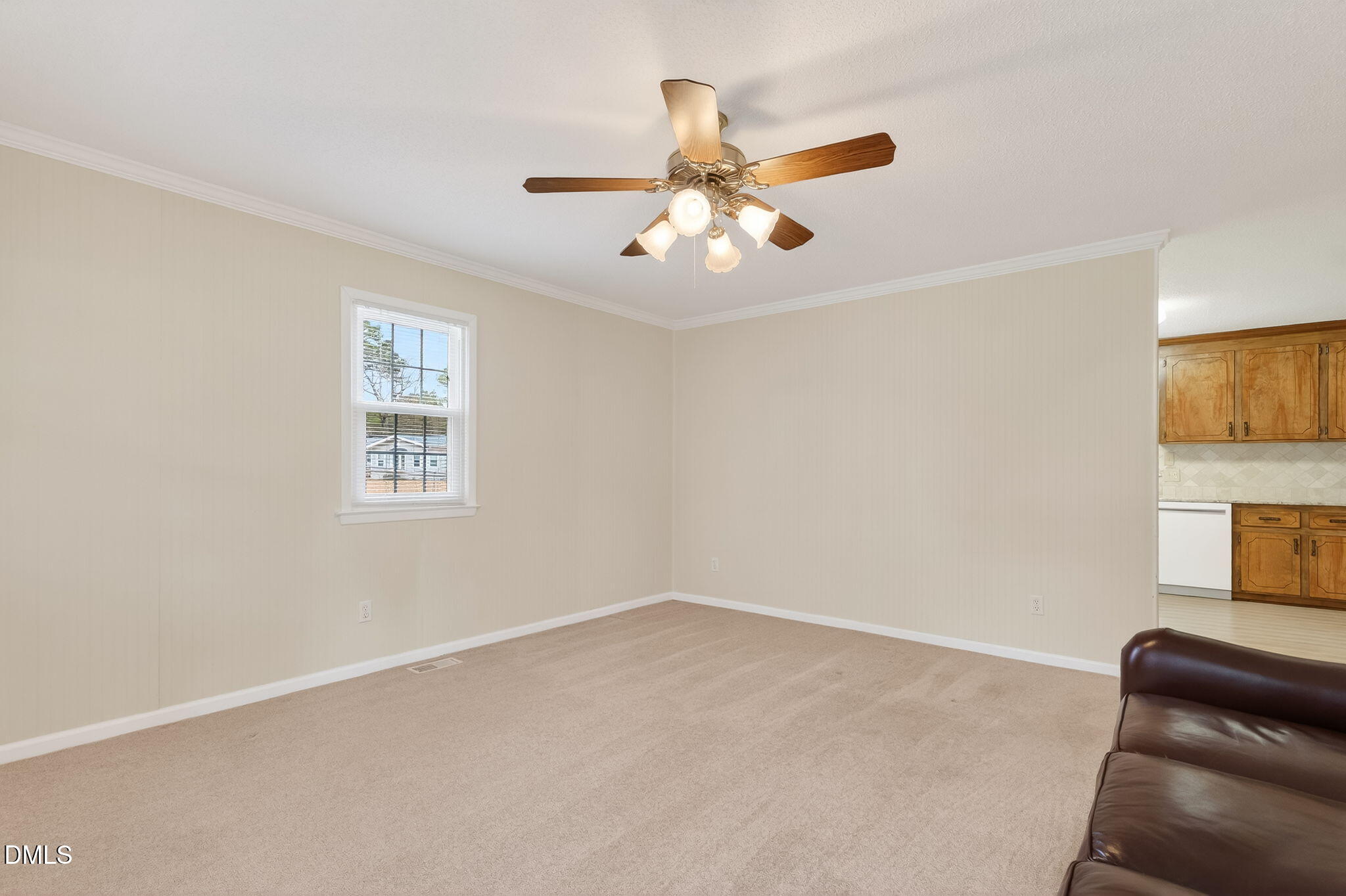 6313 Brack Penny Road Raleigh, NC 27603 - Photo 11 of 41 an empty room with windows and fan