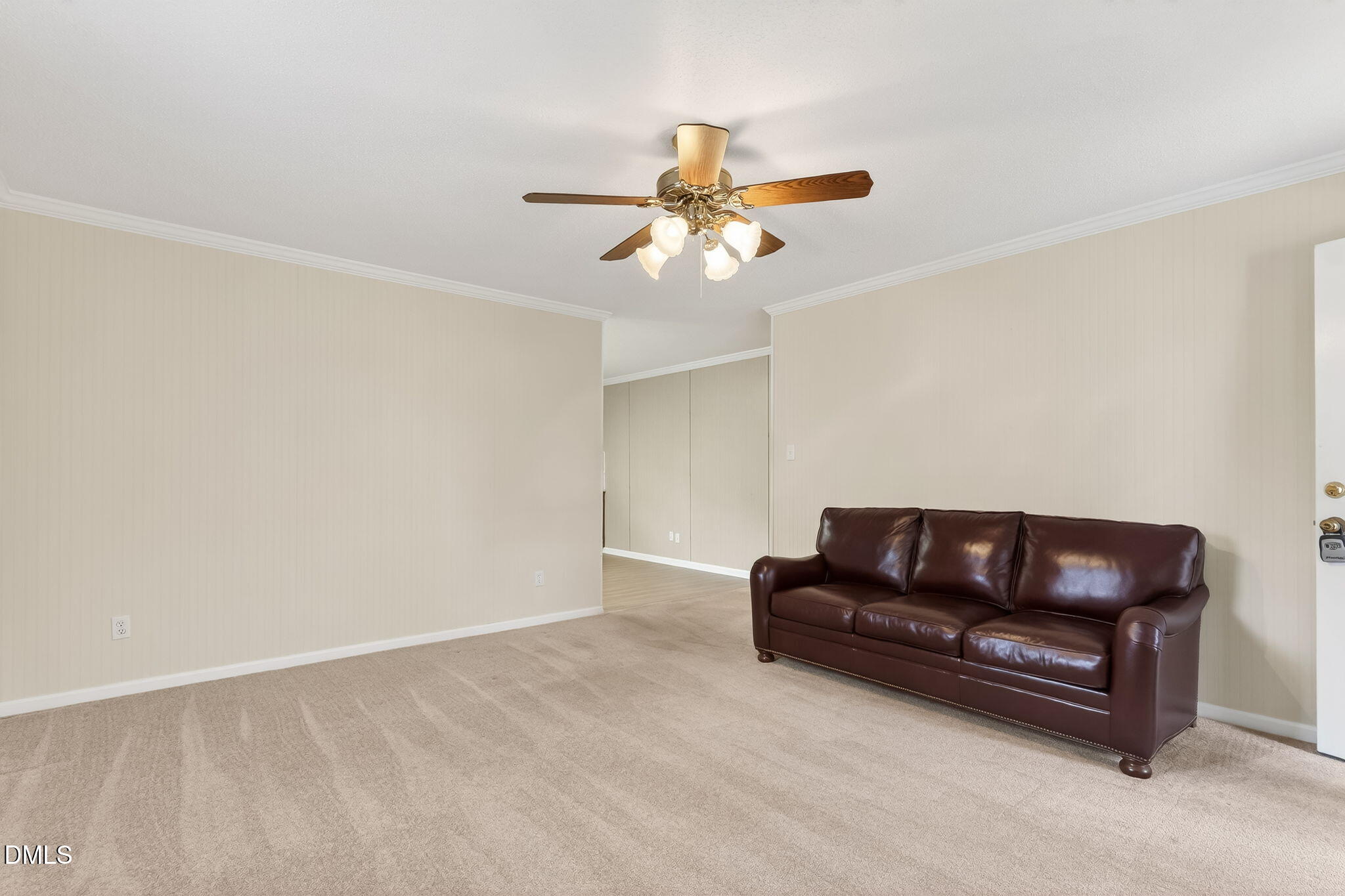 6313 Brack Penny Road Raleigh, NC 27603 - Photo 12 of 41 a living room with furniture and a ceiling fan