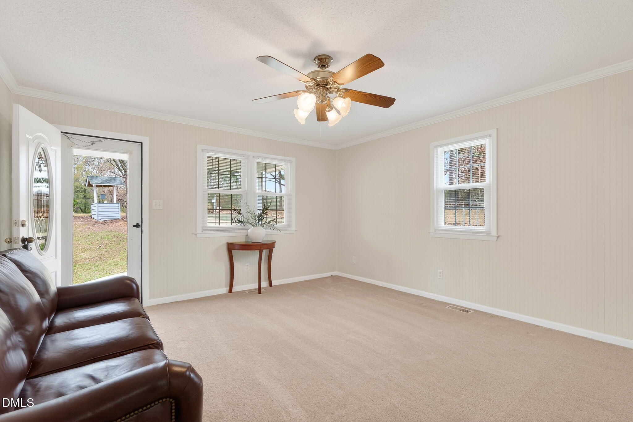 6313 Brack Penny Road Raleigh, NC 27603 - Photo 13 of 41 a living room with furniture and windows
