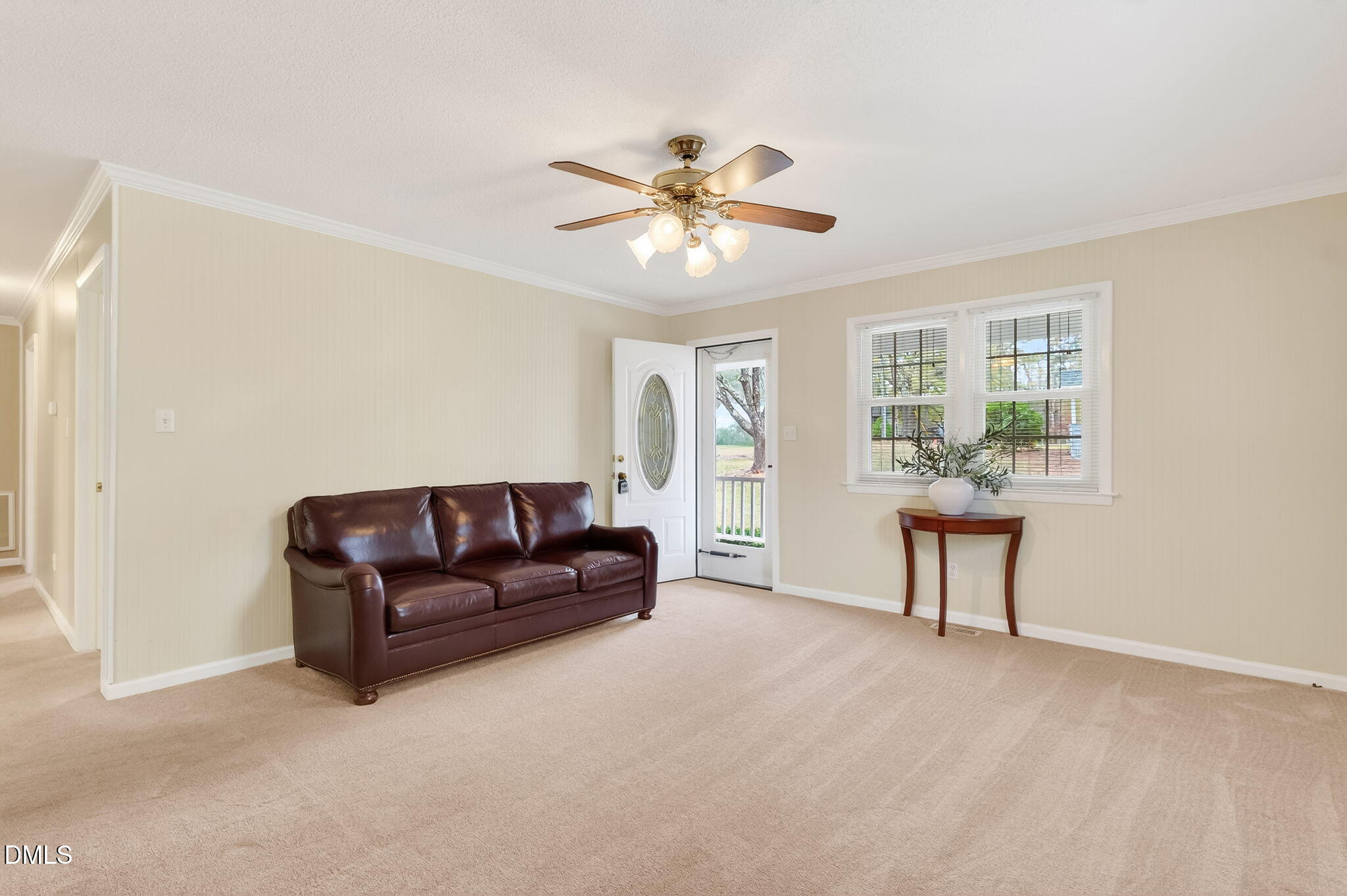 6313 Brack Penny Road Raleigh, NC 27603 - Photo 14 of 41 a living room with furniture and a window