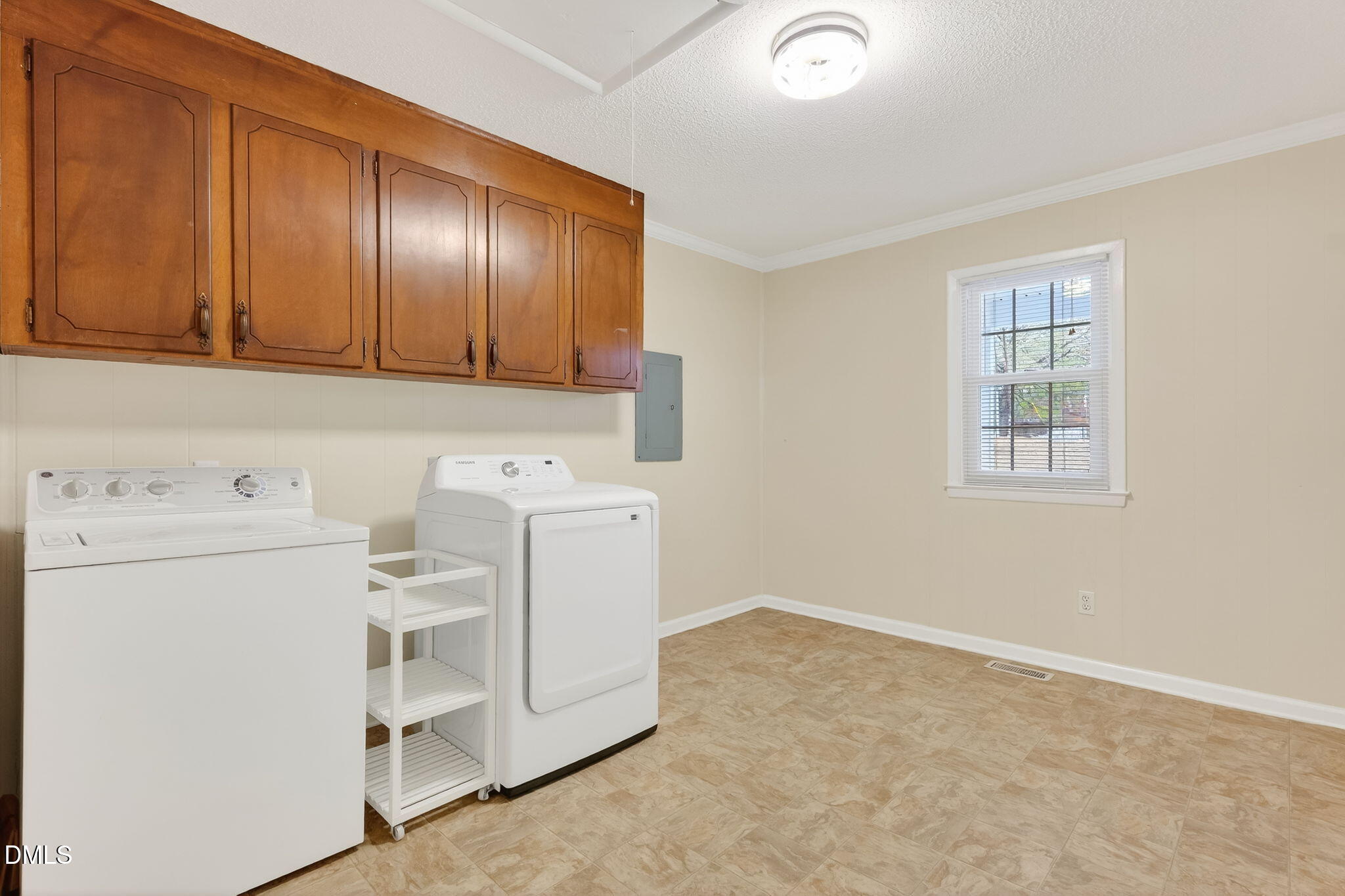 6313 Brack Penny Road Raleigh, NC 27603 - Photo 19 of 41 a utility room with dryer and washer