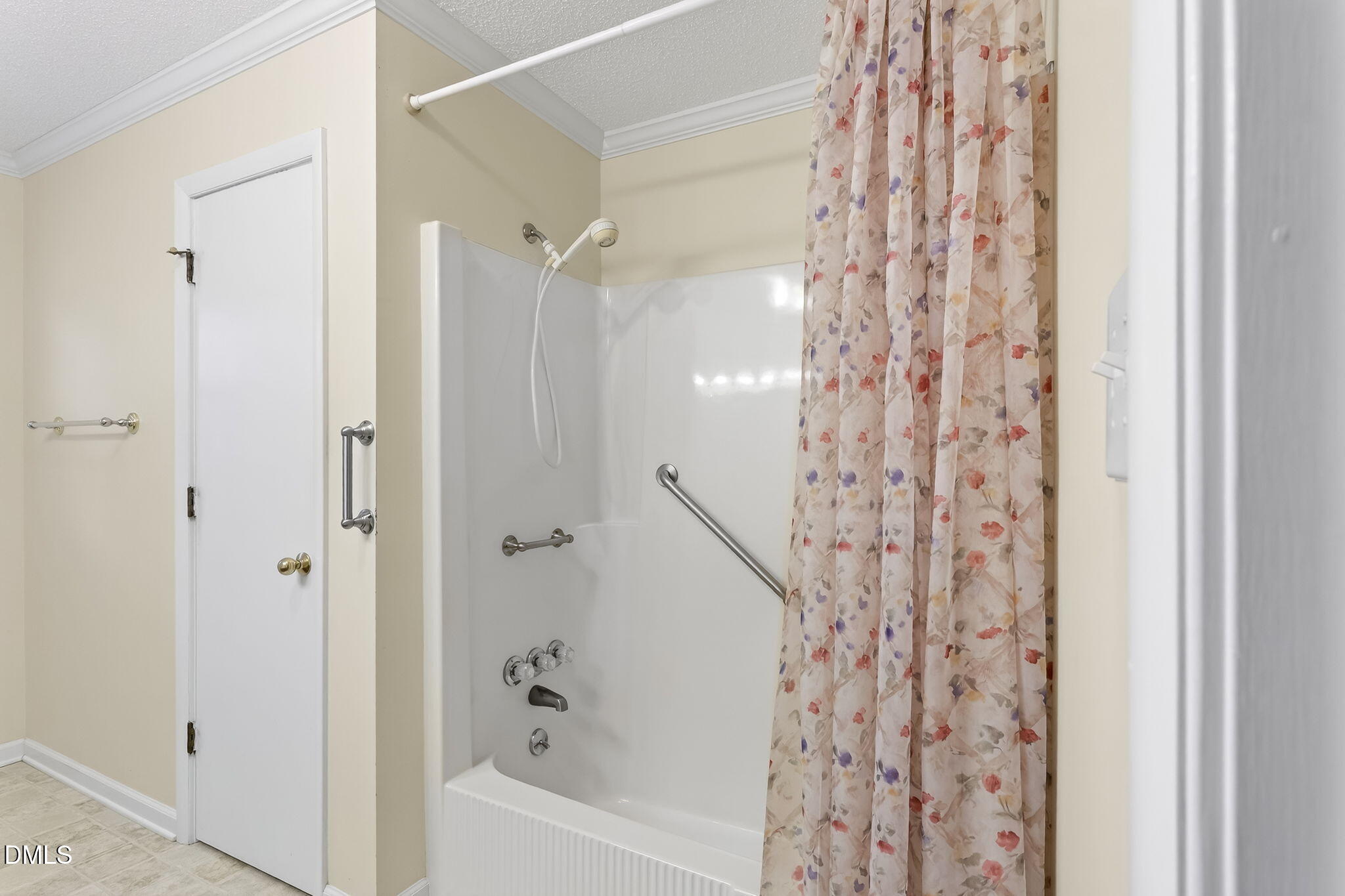 6313 Brack Penny Road Raleigh, NC 27603 - Photo 25 of 41 a bathroom with a bathtub and shower