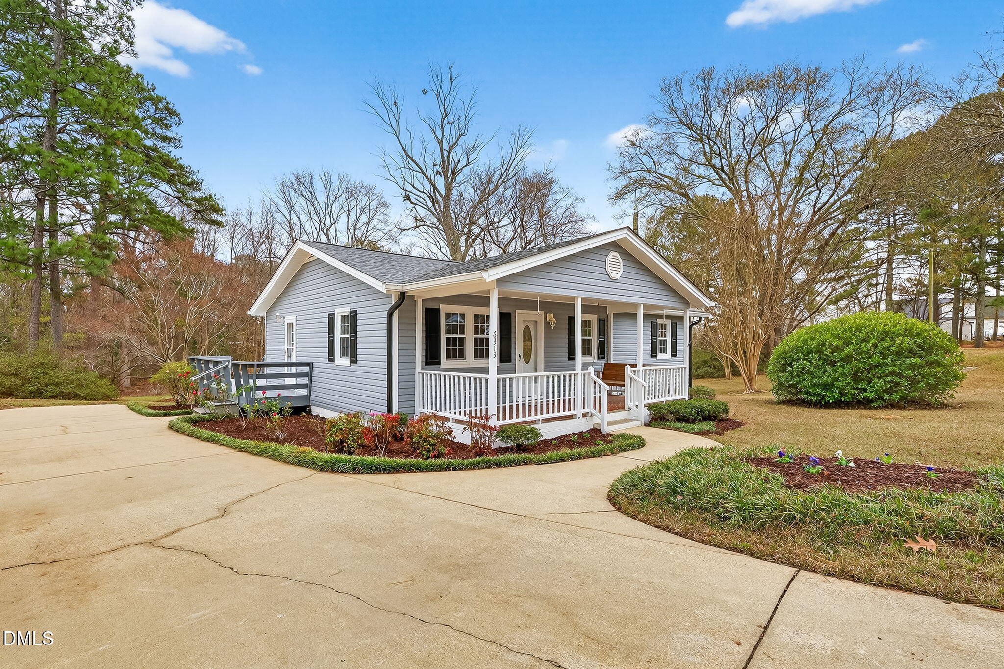 6313 Brack Penny Road Raleigh, NC 27603 - Photo 3 of 41 a front view of a house with a yard