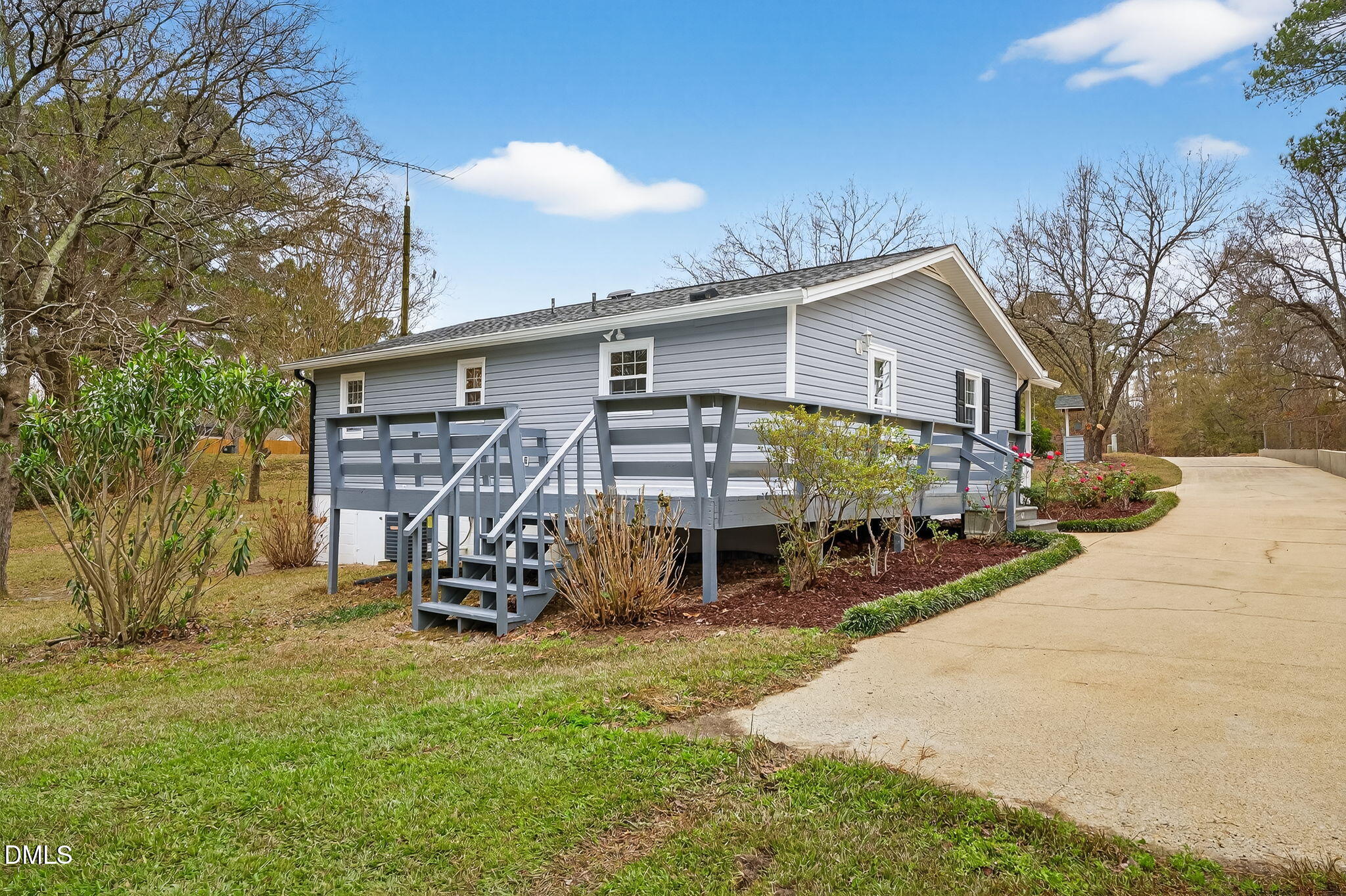 6313 Brack Penny Road Raleigh, NC 27603 - Photo 32 of 41 a view of a chair and table in backyard