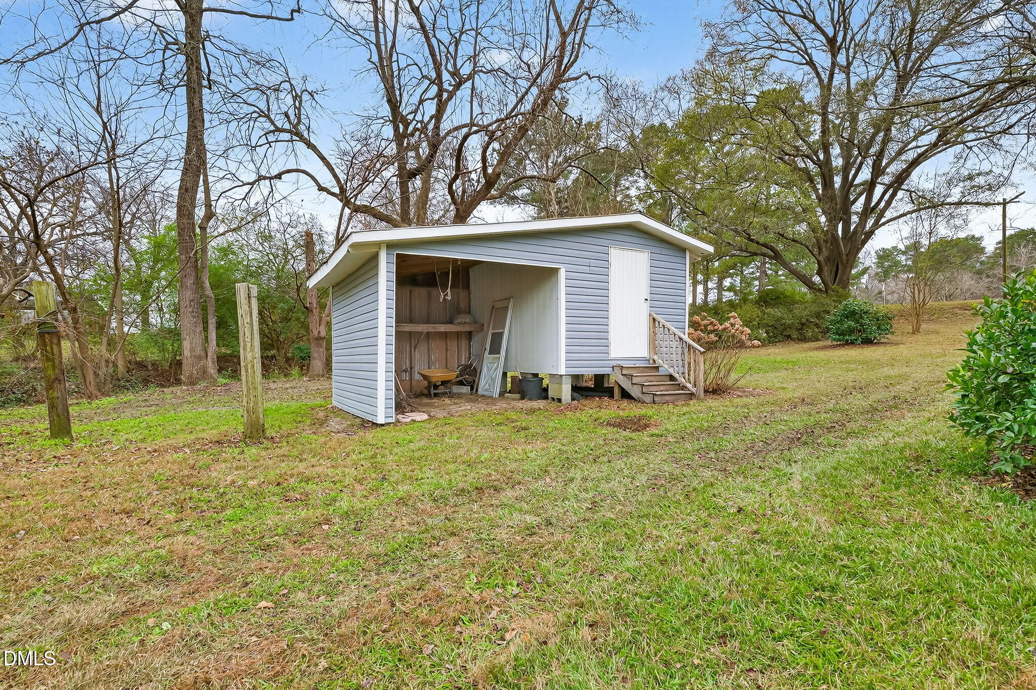6313 Brack Penny Road Raleigh, NC 27603 - Photo 35 of 41 a view of a house with a yard