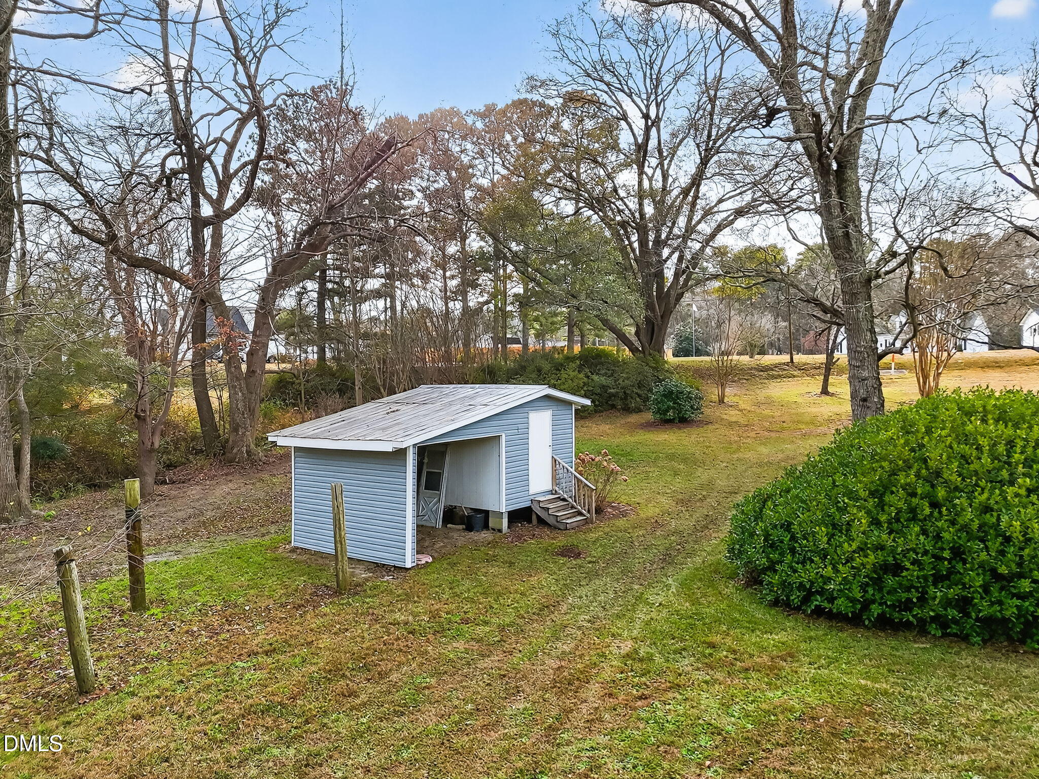 6313 Brack Penny Road Raleigh, NC 27603 - Photo 36 of 41 a view of a house with a yard and tree s