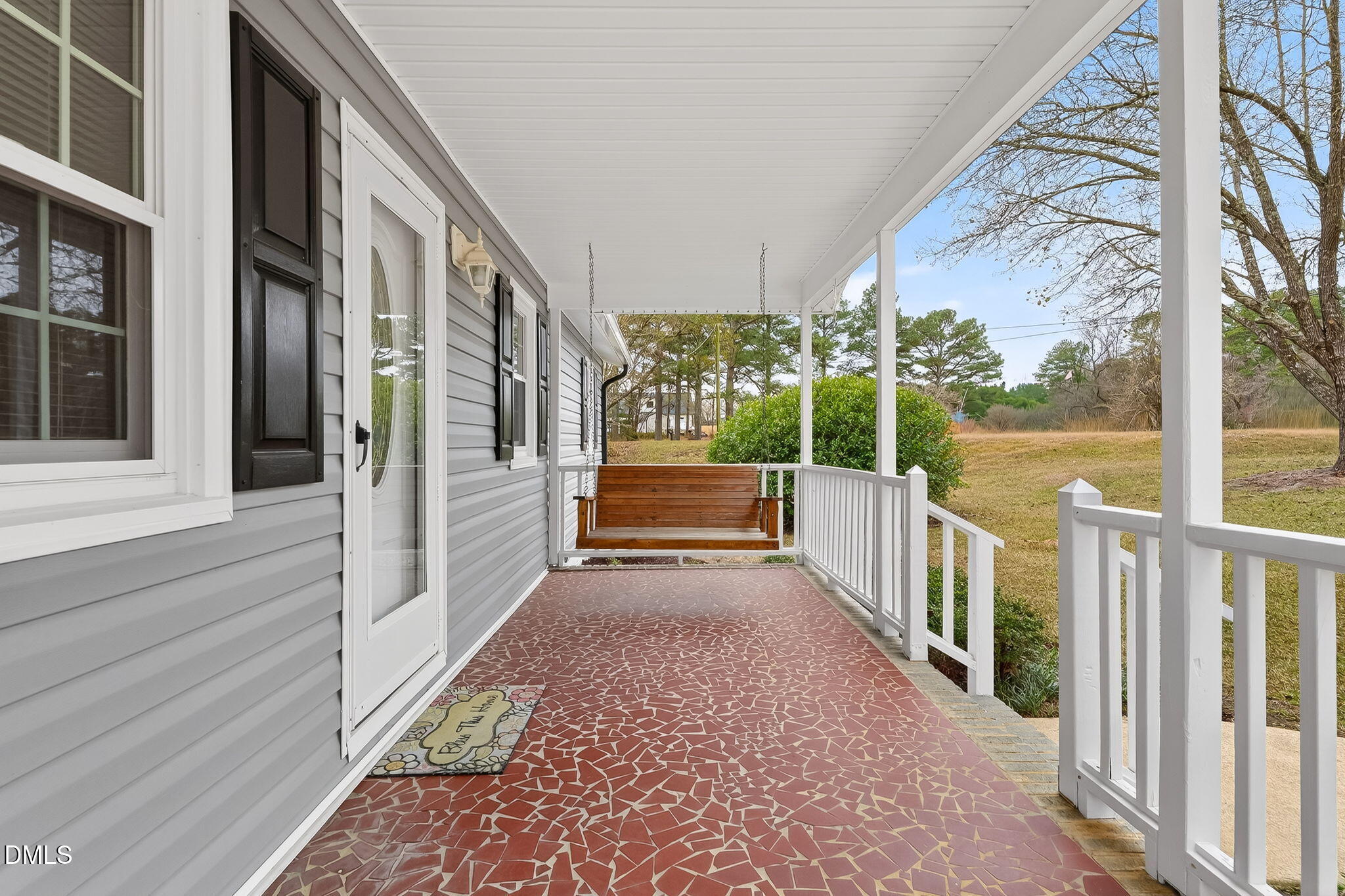 6313 Brack Penny Road Raleigh, NC 27603 - Photo 9 of 41 a view of a porch and wooden floor