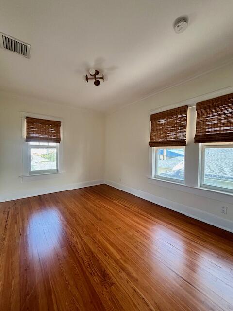 415 Upland Road West Palm Beach, FL 33401 - Photo 16 of 29 wooden floor in an empty room with a window