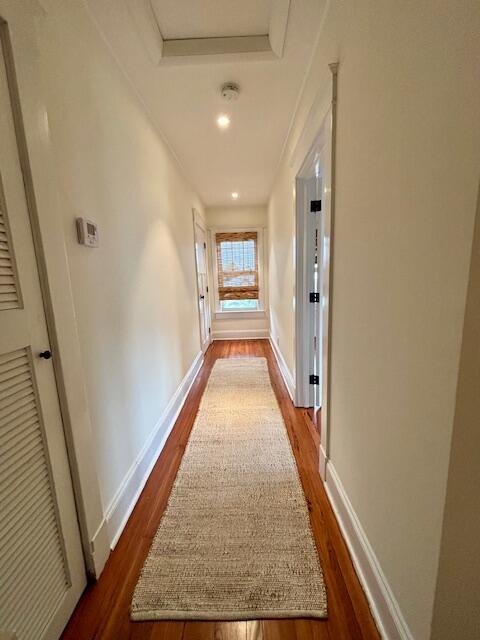415 Upland Road West Palm Beach, FL 33401 - Photo 19 of 29 a view of a hallway with wooden floor and staircase