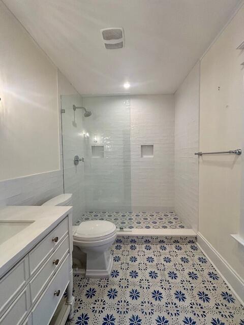 415 Upland Road West Palm Beach, FL 33401 - Photo 21 of 29 a bathroom with a sink toilet and shower
