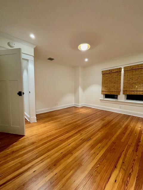 415 Upland Road West Palm Beach, FL 33401 - Photo 24 of 29 a view of an empty room with wooden floor