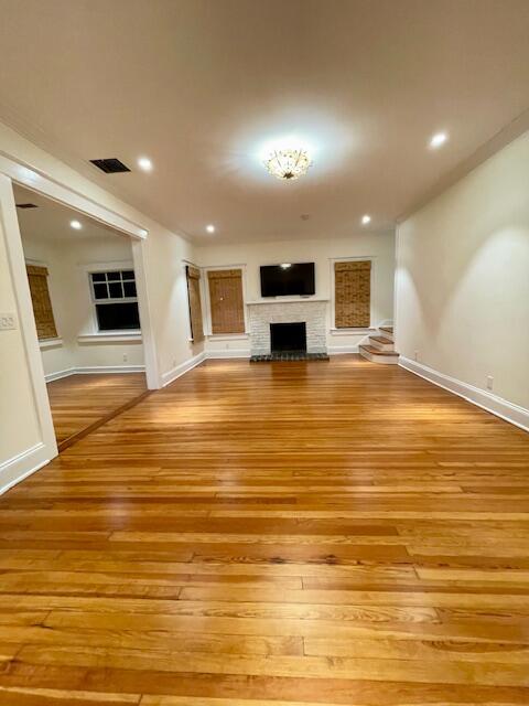 415 Upland Road West Palm Beach, FL 33401 - Photo 6 of 29 a view of a kitchen with kitchen island a sink stainless steel appliances and cabinets