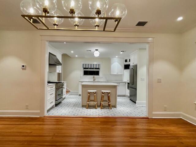 415 Upland Road West Palm Beach, FL 33401 - Photo 9 of 29 a view of a living room with a sink and chandelier